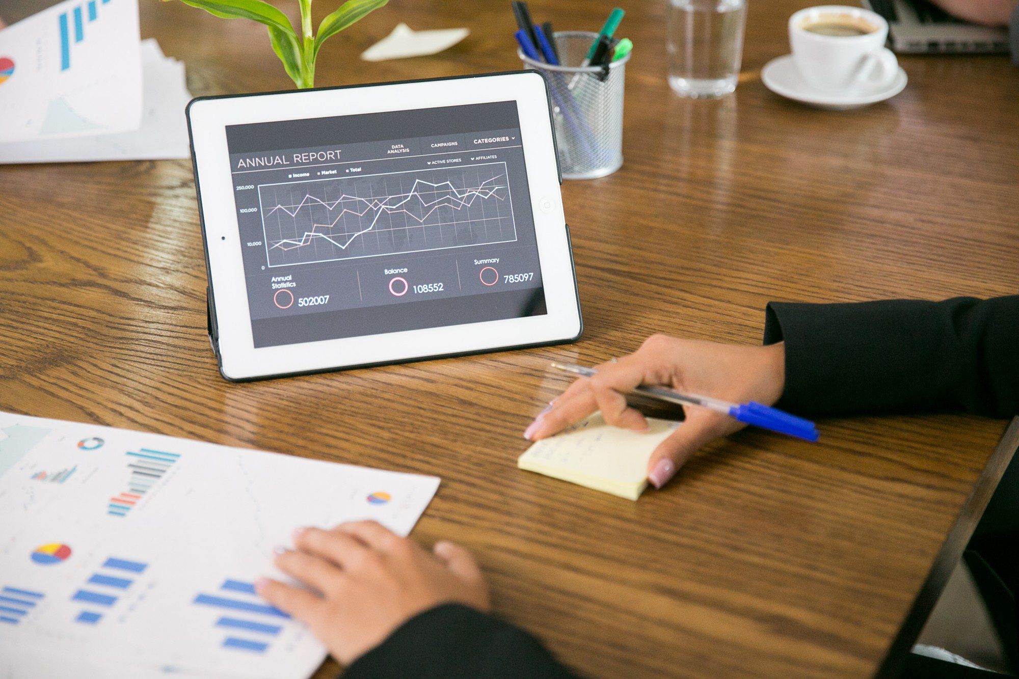 Tablet with charts in the coferene room Tablet with charts in the coferene room