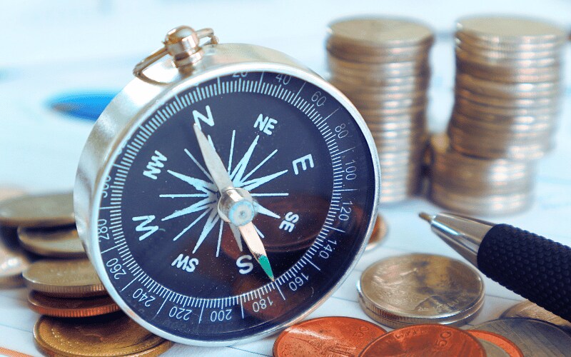 Ethical compass on the desk of accountant