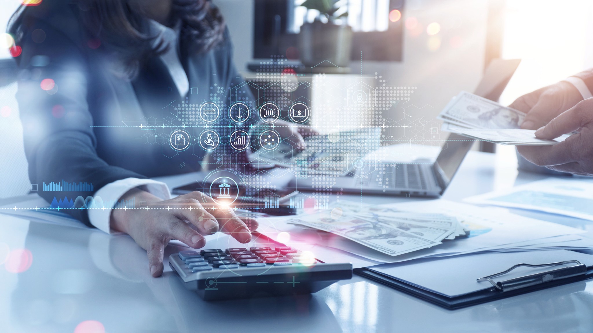 Accountant use calculator to calculate the company's financial results with icon banking on data network connection of finance and banking and analytical research, income, tax and business growth.