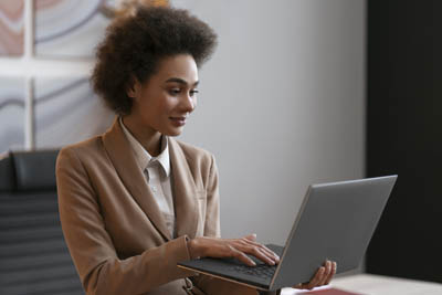 capital investment and financial planning Person working on laptop