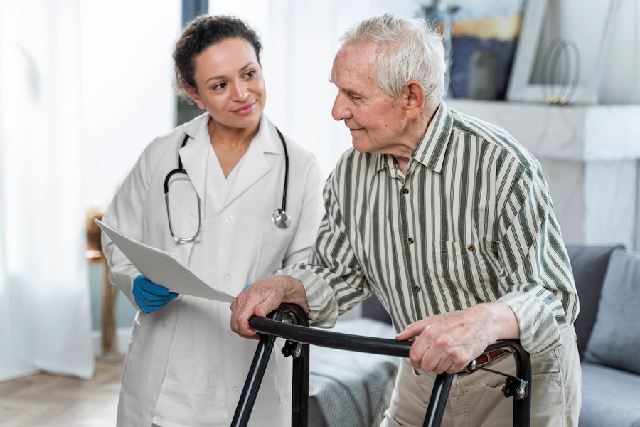 long-term-care doctor with patient on treadmill
