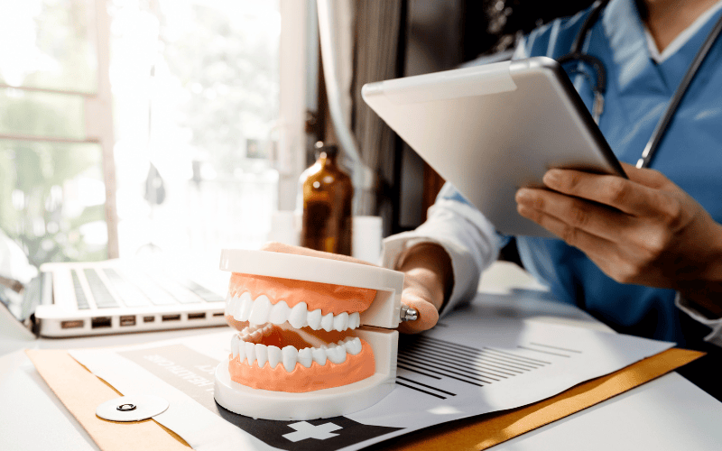 dentist reviewing financial reports